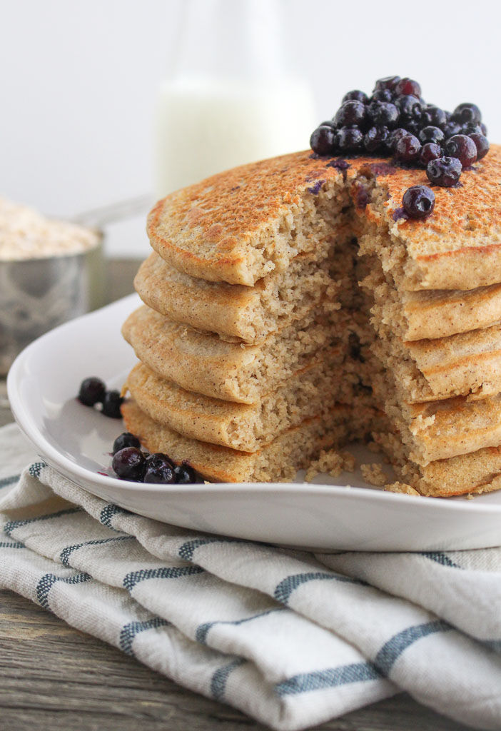 Oat flour pancakes cut with wild blueberries