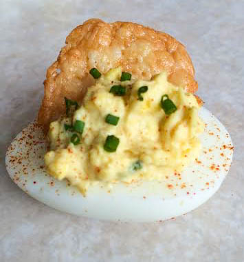 Cheesy Deviled Eggs with a Cheese Crisp