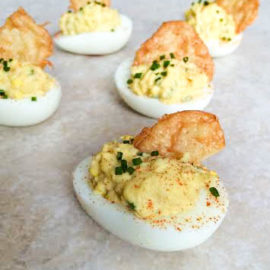 Cheesy Deviled Eggs with a Cheese Crisp