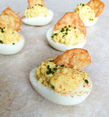 Cheesy Deviled Eggs with a Cheese Crisp