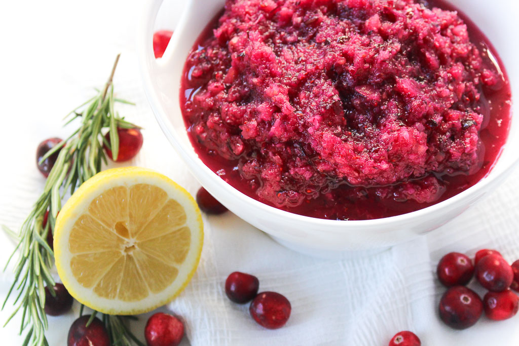 close up of cranberry relish made with real cranberries next to lemon half