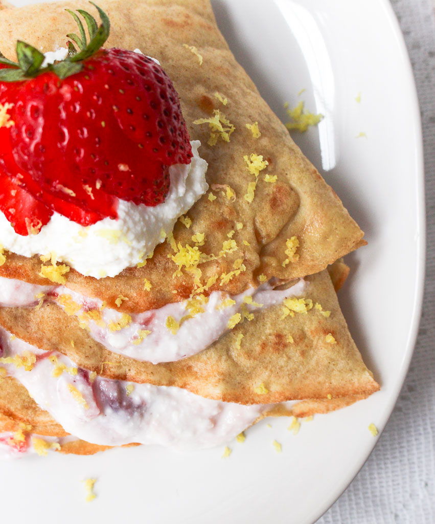 Strawberry Lemon Ricotta Filled Crepes - Even if you prefer sweet or savory crepes, this crepe recipe is the perfect base for any filling. Recipe via Chef Julie Harrington, RD @ChefJulie_RD #crepes #french #france #lemon #strawberry #ricotta #breakfast