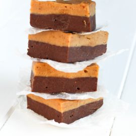 Double Layer Chocolate Peanut Butter Fudge stacked on top of each other