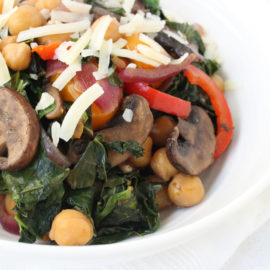 Balsamic Kale and Vegetable Saute in a white bowl
