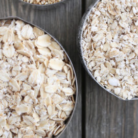 different varieties of oats in measuring cups
