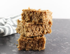 peanut butter oat bars stacked on top of each other
