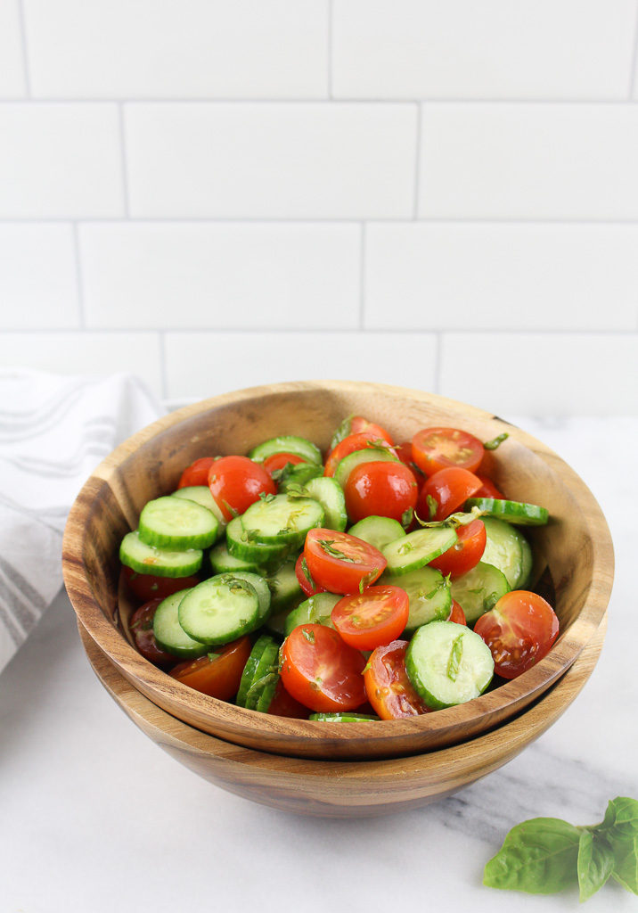 Tomato Cucumber Salad in a wooden bowl